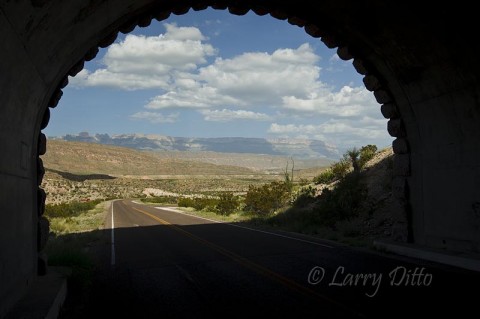 Big Bend National Park_Larry Ditto_70K8960 Park Road passing through a tunnel on the east side of Big Bend National Park with the Boquillas Canyon rim in the distance.