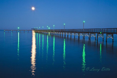 Fishing pier at night, Fulton, Texas.