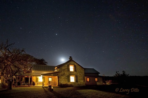 The Block Creek Natural Area Bed & Breakfast on a cool, clear night with crescent moon.