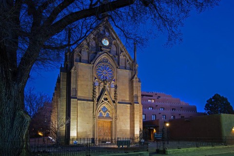 Historic Santa Fe Church at night.