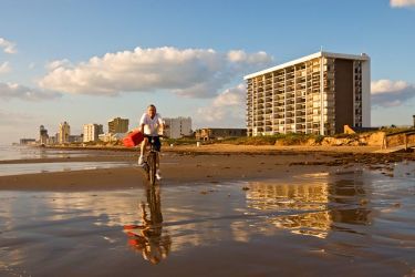 Bicycle on South Padre Island beach at sunrise, September