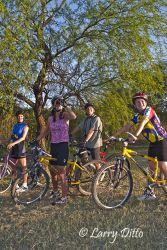 Mother and son birding with friends by bicycle, s. Texas.