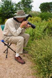 John Rosford of Ingram, Texas photographing butterflies at the NABA (North American Butterfly Association) butterfly park in Mission, Texas