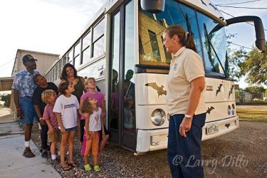Volunteer, Carolyn Anderson, leading a bat-watching tour at Devil's Sinkhole State Natural Area, Rocksprings, Texas