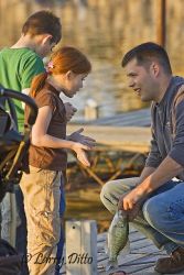 Father and daughter talking fishing