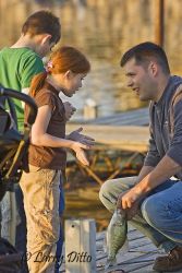 Father and daughter talking fishing