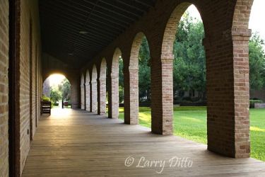 Porch with brick arches on the Administration building at historic Fort Brown in Brownsville, Texas. Fort Brown is now part of the University of Texas-Brownsville.