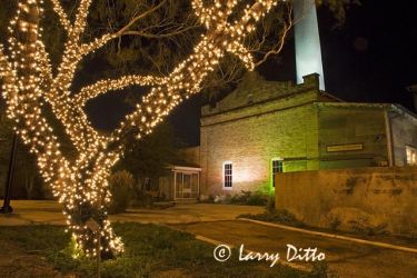The renovated Hidalgo Pumphouse, now a museum, is lighted along with about 50 trees spread across the landscaped grounds in December.