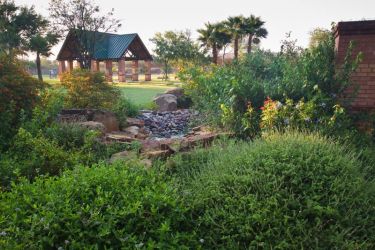 Along the paved walking path at the Old Hidalgo Pumphouse, visitors can take a break in the shade of a large kiosk with several nature photos and interpretive information.