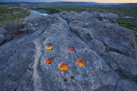 Aboriginal metate holes in limestone by the Rio Grande at Big Bend National Park, Texas