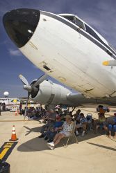 What better place to watch an air show on a warm spring day than from the shadow of a huge aircraft. The Commerative Air Force Air Fiesta in Brownsville, Texas attracts thousands of enthusiastic viewers to the Brownsville Air Port each spring.