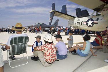 What better place to watch an air show on a warm spring day than from the shadow of a huge aircraft. The Commerative Air Force Air Fiesta in Brownsville, Texas attracts thousands of enthusiastic viewers to the Brownsville Air Port each spring.