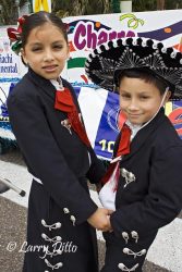 Sister and brother, Michaela and Matthew Francis dressed in Charro costumes for the Charro Days Festival costume competition in Brownsville, Texas