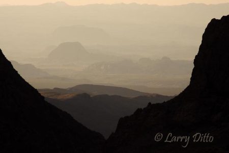 View of west Texas desert in Big Bend National Park at sunset through the "Window" from the Chisos Mountain basin, November.