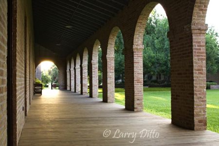 Porch with brick arches on the Administration building at historic Fort Brown in Brownsville, Texas. Fort Brown is now part of the University of Texas-Brownsville.