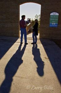 Danny and Susan Hoehne of Harlingen headed through the brick archway to the birding platform at the Roma Bluffs World Birding Center on the Rio Grande in Roma, Texas