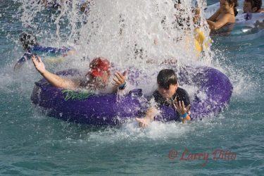 Tubers enjoy a leisurely ride on the Rio Aventura at Schlitterbaun Beach Waterpark on South Padre Island. Along they way, there are thrills like water shoots, white water rapids and gentle drops. Much of the rio is lined with banana trees and colorful beaches, shaded palapas and refreshement stands.