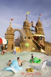 The giant Sand Castle is located in the middle of the park and has hundreds of hands-on water play elements, slippery slides and a giant dumping pale.