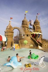 The giant Sand Castle is located in the middle of the park and has hundreds of hands-on water play elements, slippery slides and a giant dumping pale.